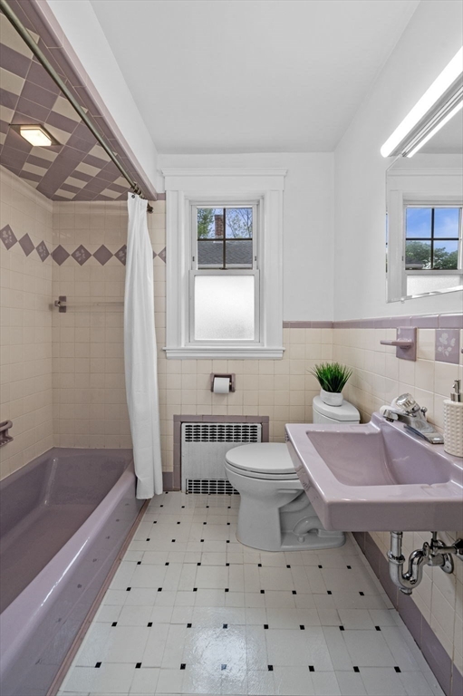 33 Intervale Avenue Saugus, MA 01906 - Photo 22 of 40 a bathroom with a sink a toilet and shower