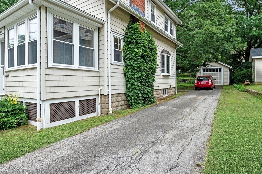33 Intervale Avenue Saugus, MA 01906 - Photo 39 of 40 a front view of a house with a yard and garage