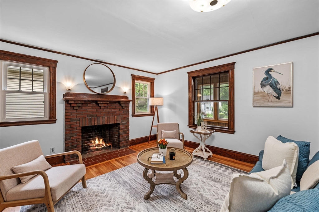 33 Intervale Avenue Saugus, MA 01906 - Photo 7 of 40 a living room with furniture a window and a fireplace