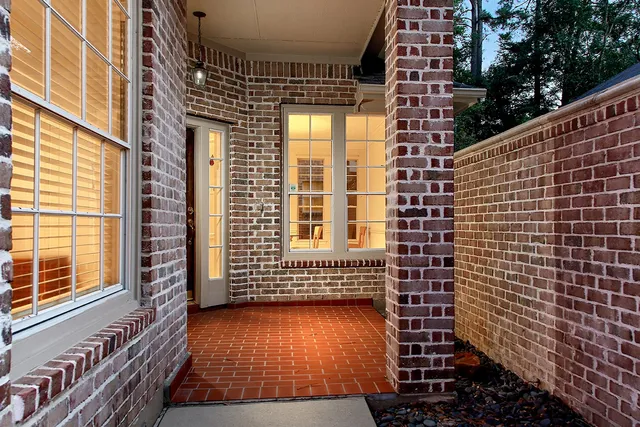 a view of a balcony with door