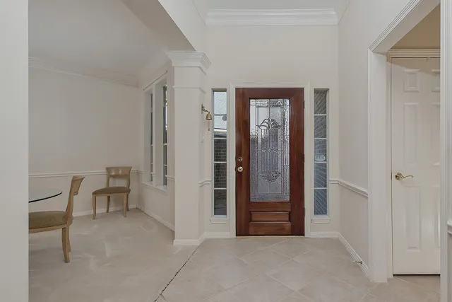 a view of room with furniture and a window