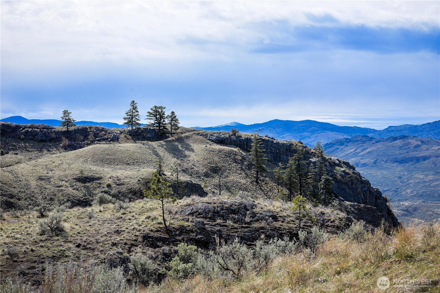 -xxx Emily Road Tonasket, WA 98855 - Photo 15 of 31 a view of mountain and mountains in the background
