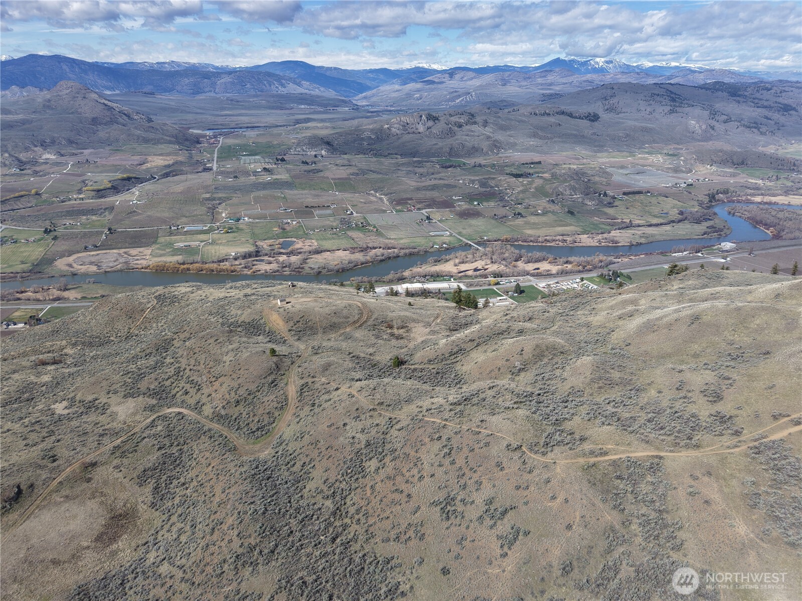 -xxx Emily Road Tonasket, WA 98855 - Photo 28 of 31 a view of a dry yard with mountains in background