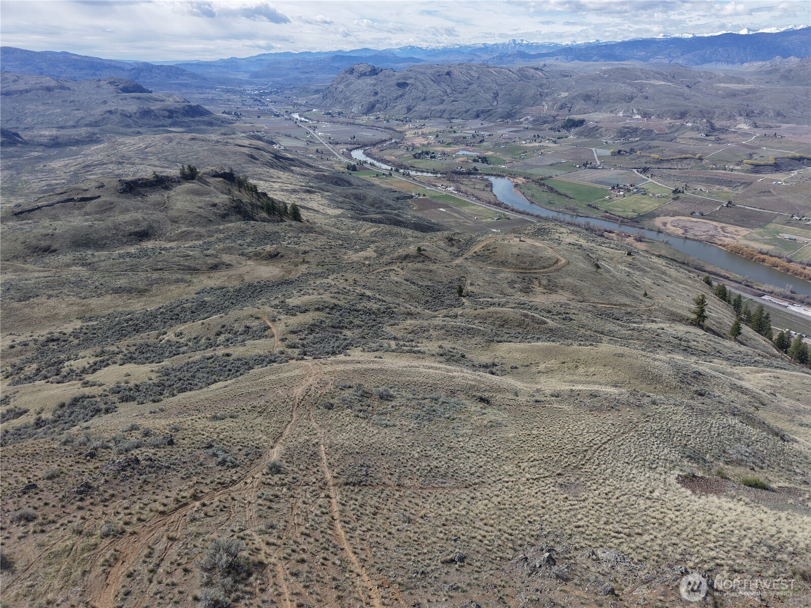 -xxx Emily Road Tonasket, WA 98855 - Photo 29 of 31 a view of aerial view of house with a field