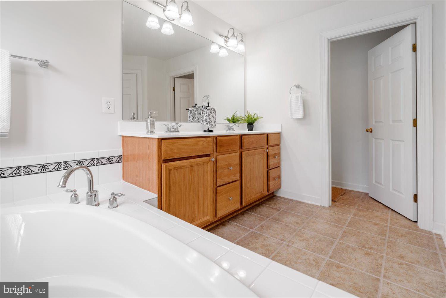 1510 Rutland Way Hanover, MD 21076 - Photo 26 of 48 Dual vanities and private water closet.