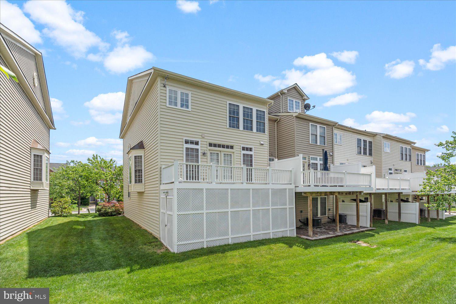 Easy side yard access to rear of townhome