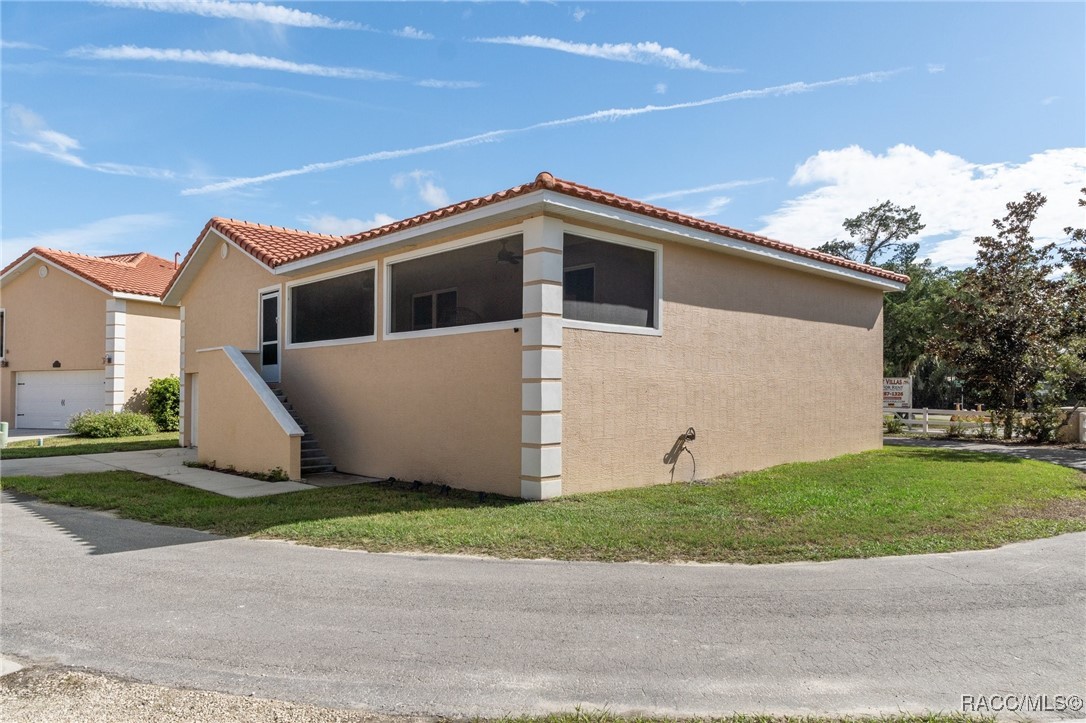 4865 South Tromp Loop Homosassa, FL 34448 - Photo 23 of 30 a front view of house with yard