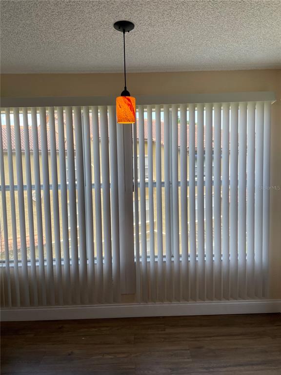 5144 Conroy Road, Unit 32 Orlando, FL 32811 - Photo 7 of 16 a view of wooden floor