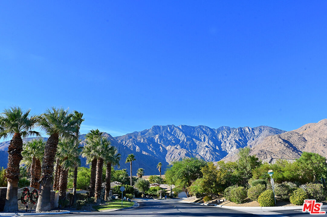 699 Alta Ridge Palm Springs, CA 92262 - Photo 2 of 31 a view of a street with a building in the background