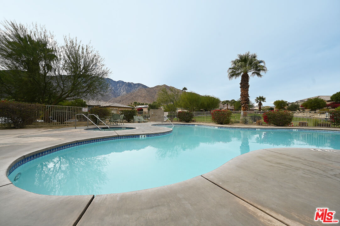 699 Alta Ridge Palm Springs, CA 92262 - Photo 24 of 31 swimming pool view with a lake view