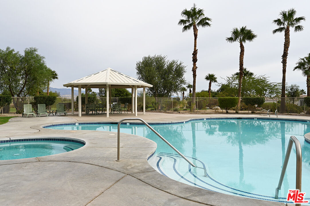 699 Alta Ridge Palm Springs, CA 92262 - Photo 28 of 31 a view of a swimming pool with a patio