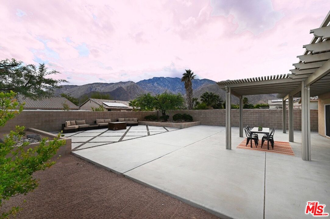 699 Alta Ridge Palm Springs, CA 92262 - Photo 6 of 31 a view of a terrace with chairs