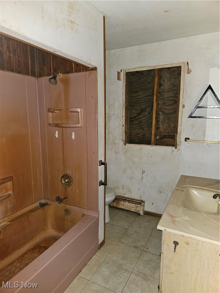 16940 Thompson Road Thompson, OH 44086 - Photo 12 of 30 Bathroom with vanity, shower / bath combination, and light tile patterned floors