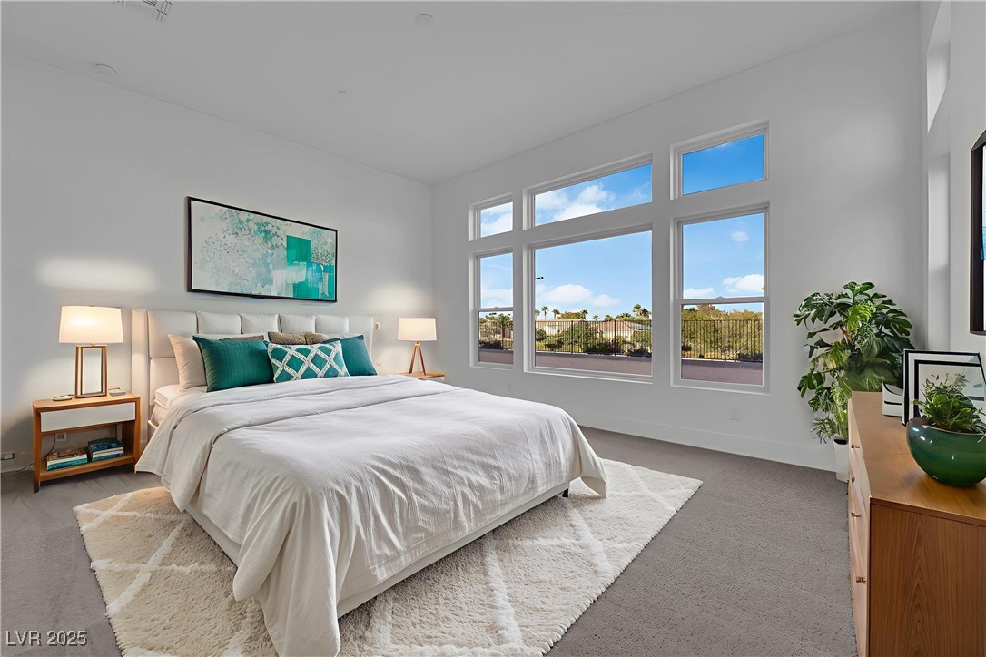 4792 Outlook Peak Street Las Vegas, NV 89135 - Photo 23 of 56 Bedroom featuring carpet floors and baseboards