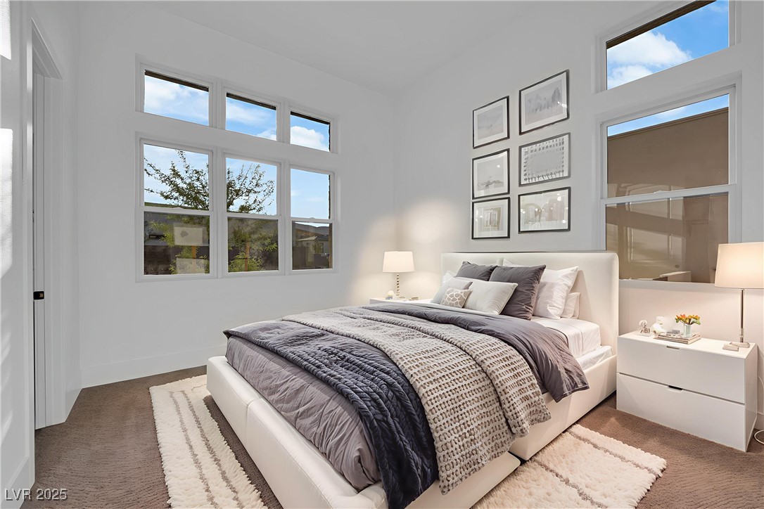 4792 Outlook Peak Street Las Vegas, NV 89135 - Photo 33 of 56 Bedroom with carpet and baseboards