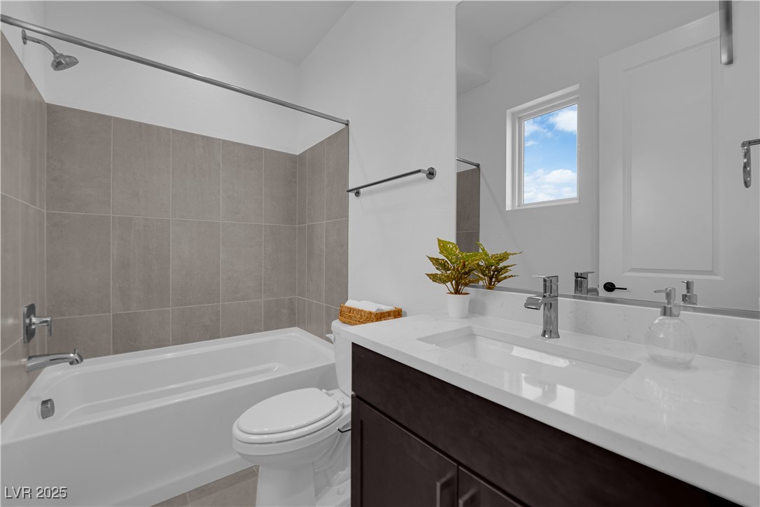 4792 Outlook Peak Street Las Vegas, NV 89135 - Photo 43 of 56 Bathroom featuring shower / bathtub combination and vanity