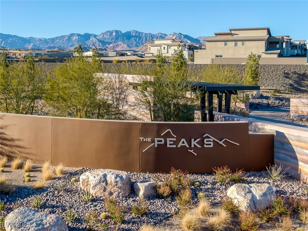 4792 Outlook Peak Street Las Vegas, NV 89135 - Photo 53 of 56 Community sign featuring a mountain view
