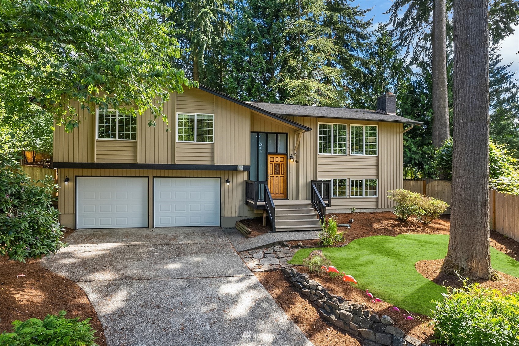 3310 199th Place Southeast Bothell, WA 98012 - Photo 1 of 30 a view of a house with a yard and large tree