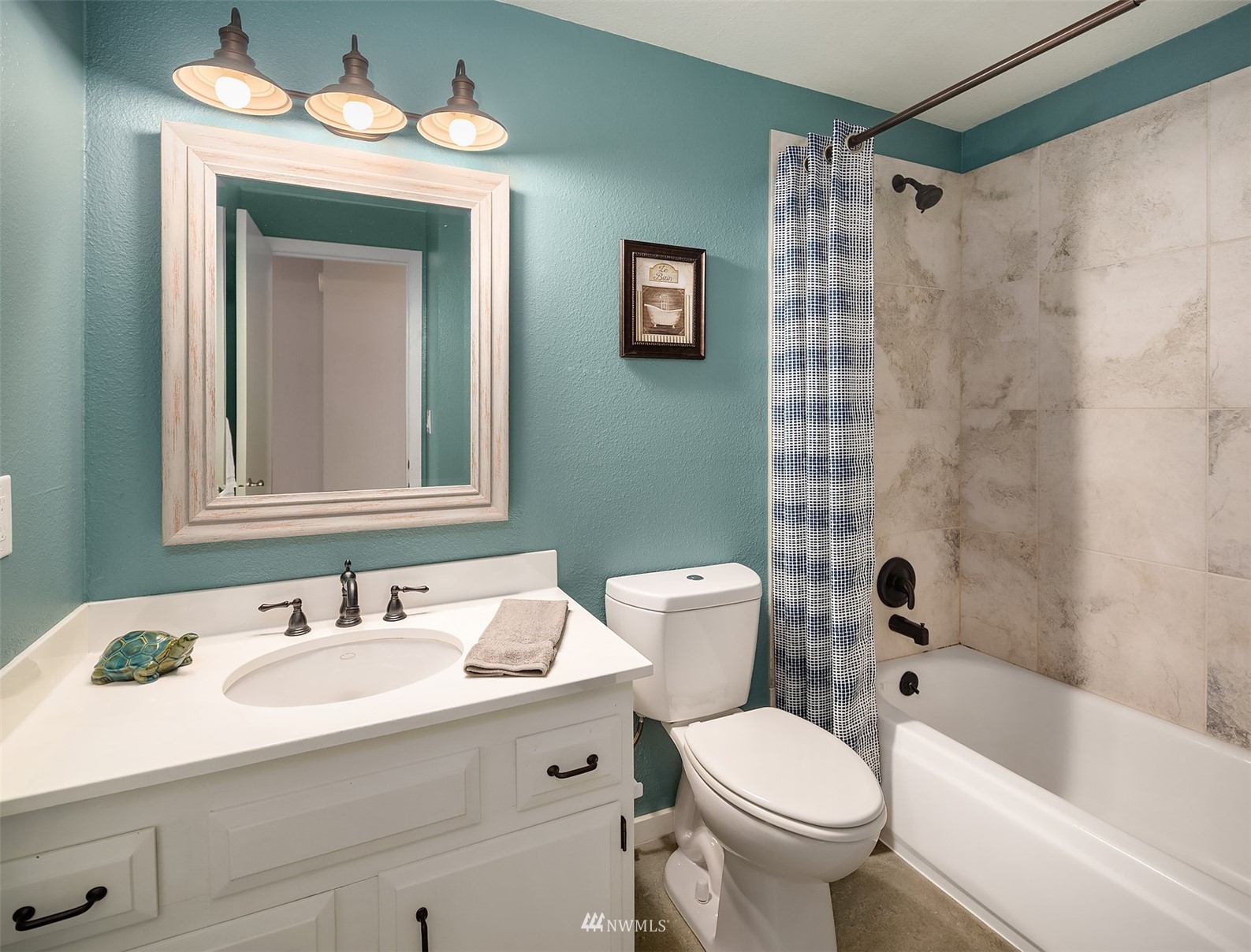3310 199th Place Southeast Bothell, WA 98012 - Photo 12 of 30 a bathroom with a sink toilet mirror and shower