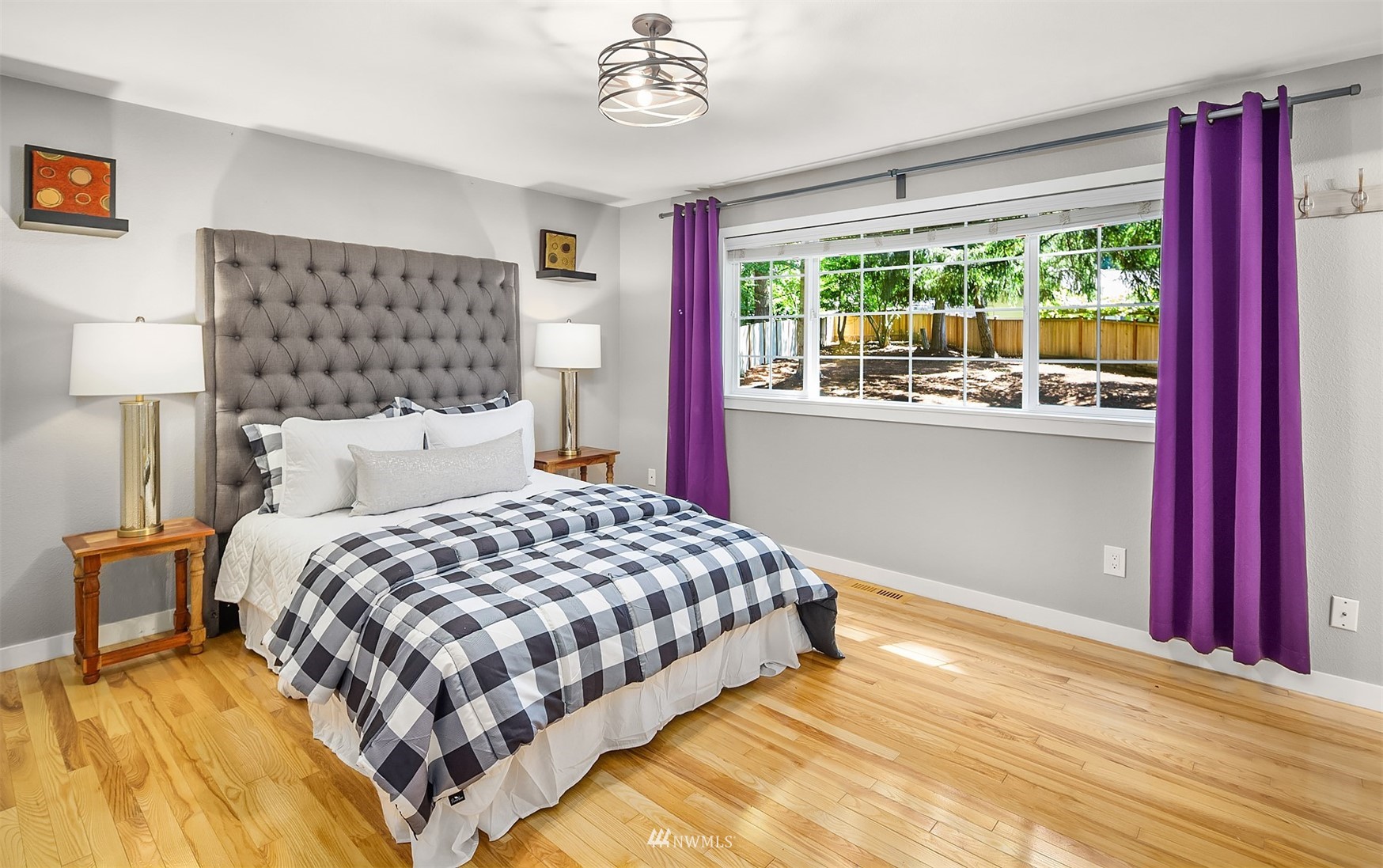 3310 199th Place Southeast Bothell, WA 98012 - Photo 13 of 30 a bedroom with a large bed and a window