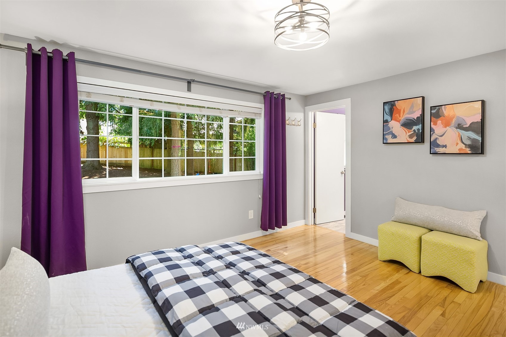 3310 199th Place Southeast Bothell, WA 98012 - Photo 14 of 30 a bedroom with a bed and a couch