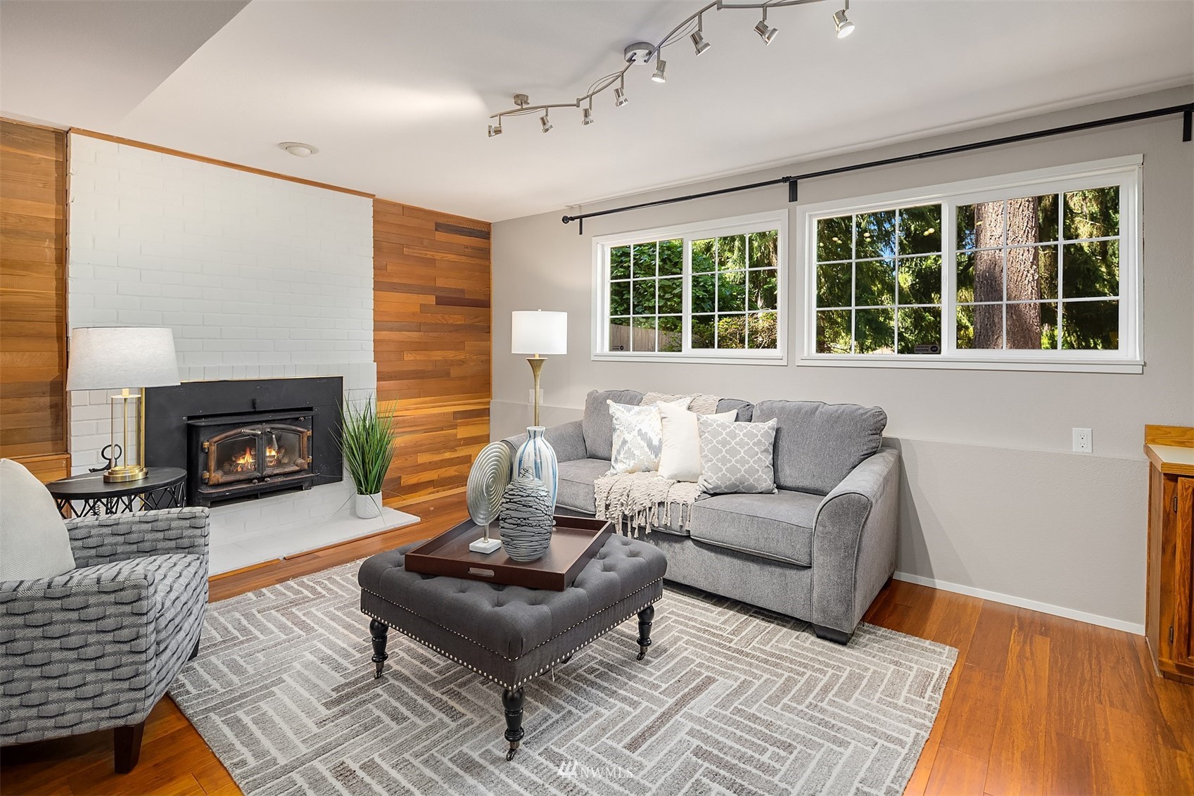 3310 199th Place Southeast Bothell, WA 98012 - Photo 19 of 30 a living room with furniture and a fireplace