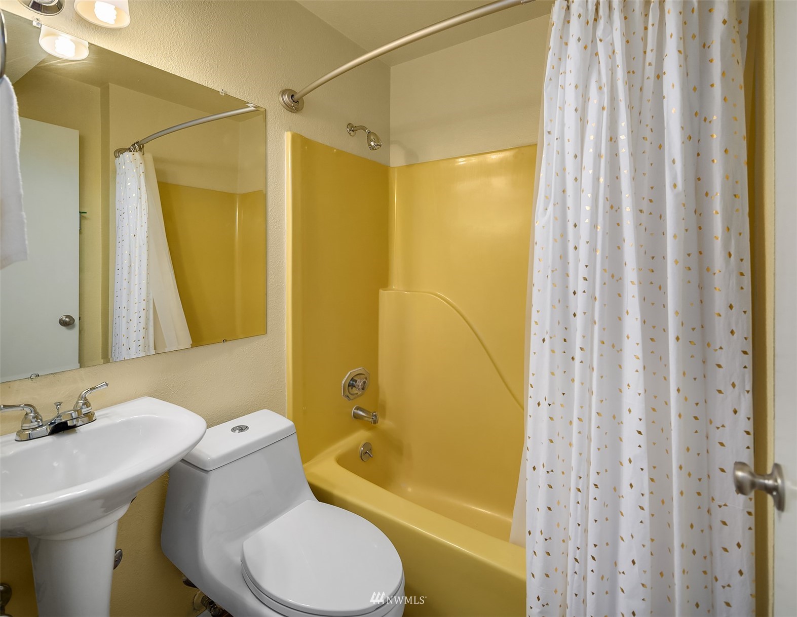 3310 199th Place Southeast Bothell, WA 98012 - Photo 21 of 30 a bathroom with a sink toilet and shower