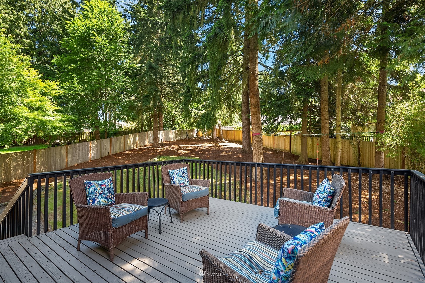 3310 199th Place Southeast Bothell, WA 98012 - Photo 23 of 30 a view of a wooden deck with furniture
