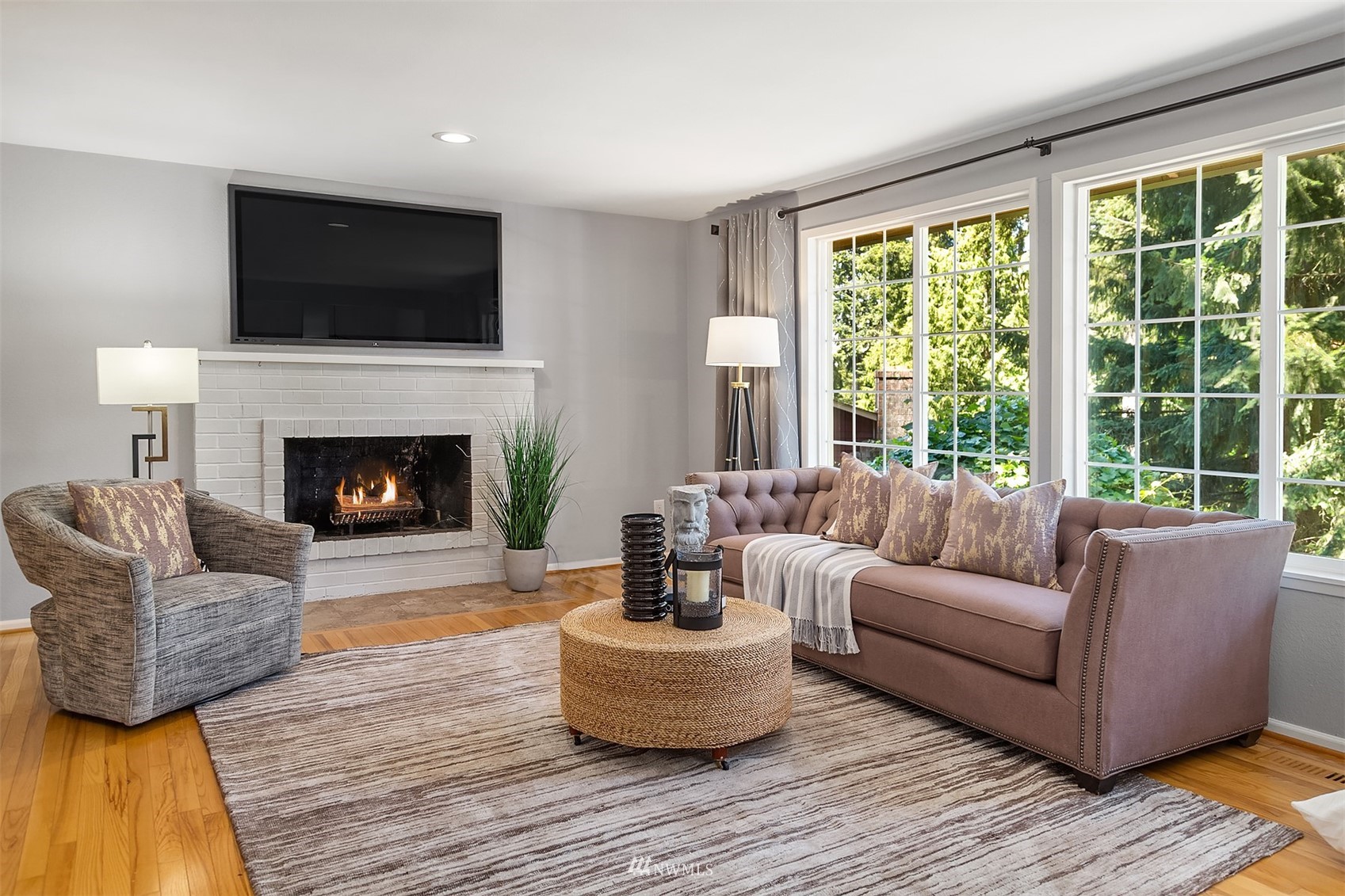 3310 199th Place Southeast Bothell, WA 98012 - Photo 4 of 30 a living room with furniture and a fireplace