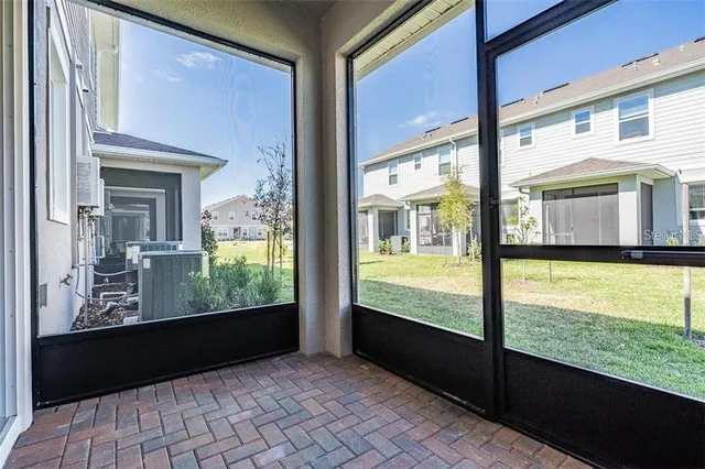 a view of large windows and a room