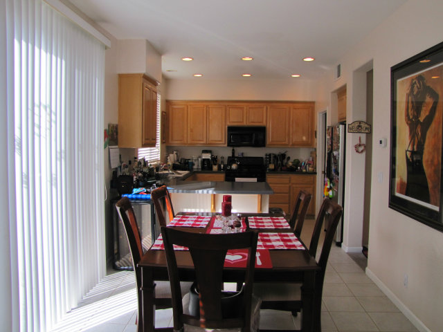 8992 Del Rio Circle Gilroy, CA 95020 - Photo 5 of 19 a view of a dining room with furniture