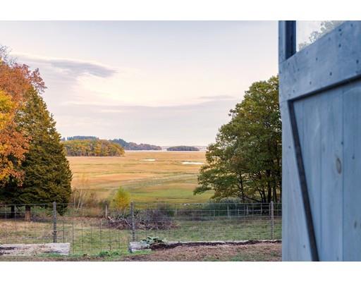 153 Argilla Road Ipswich, MA 01938 - Photo 20 of 27 a view of a lake from a yard