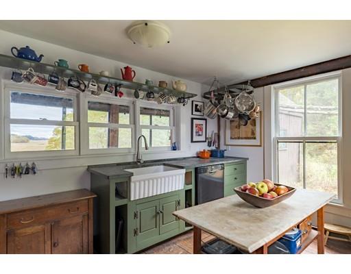 153 Argilla Road Ipswich, MA 01938 - Photo 3 of 27 a kitchen with cabinets and window