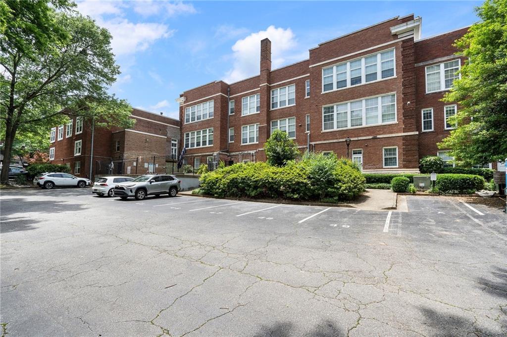 1031 State Street Northwest, Unit 106 Atlanta, GA 30318 - Photo 23 of 23 a view of a street with a building in the background