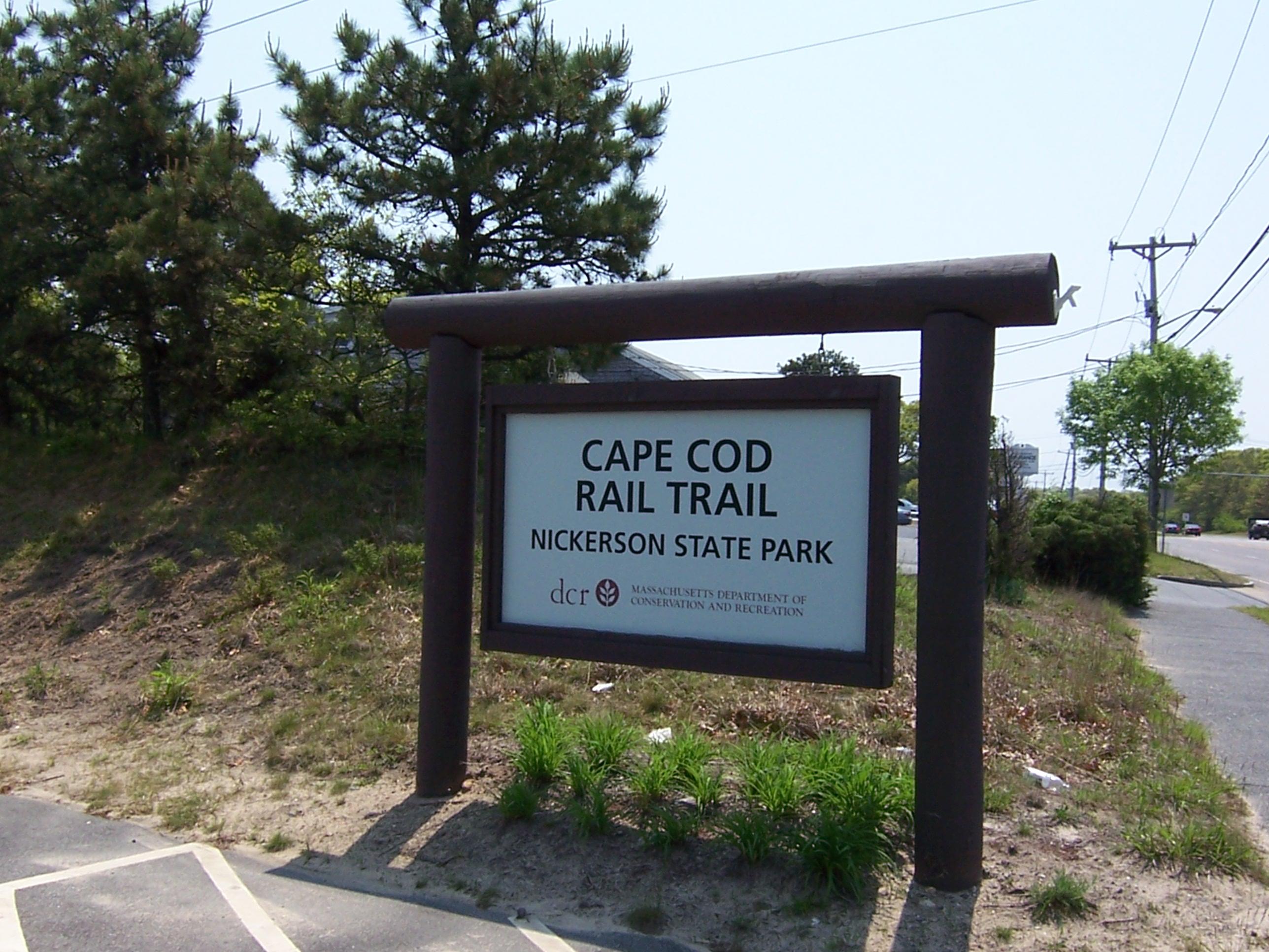 291 Lower County Road, Unit E Dennis Port, MA 02639 - Photo 29 of 31 a sign on the side of the road