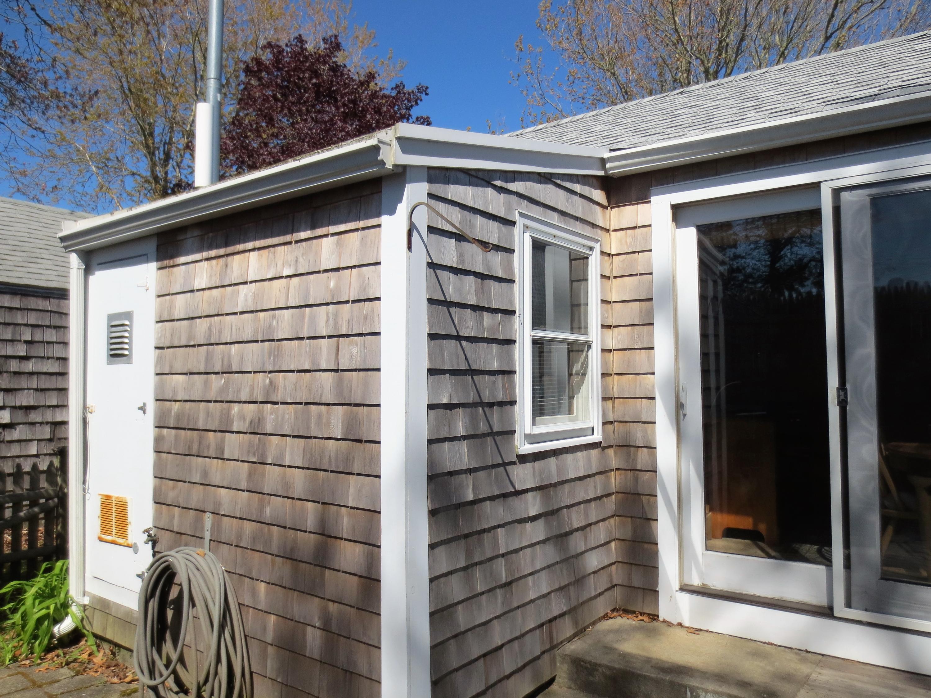 291 Lower County Road, Unit E Dennis Port, MA 02639 - Photo 5 of 31 a view of outdoor space