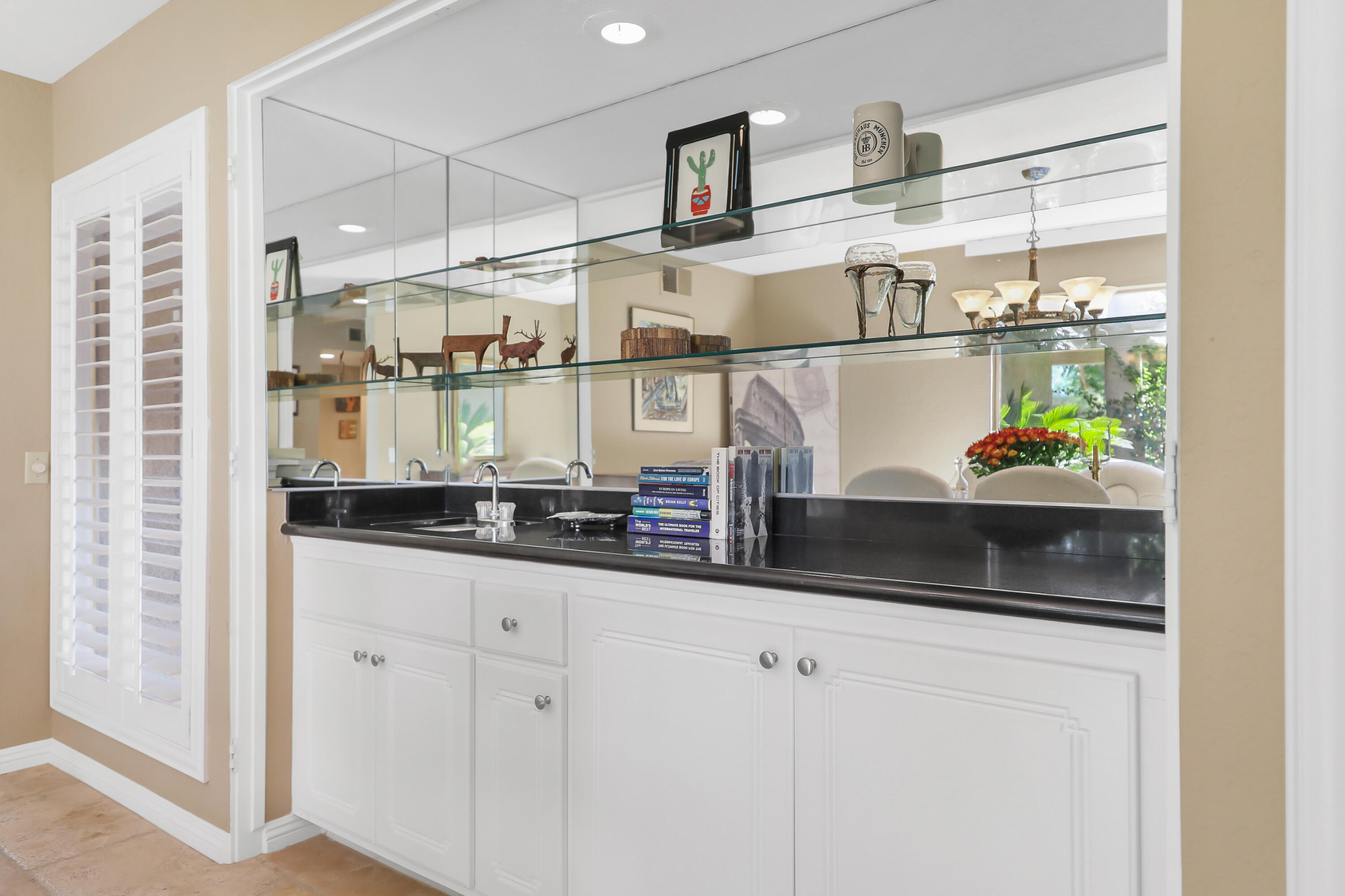 78950 Starlight Lane Bermuda Dunes, CA 92203 - Photo 12 of 40 a kitchen with stainless steel appliances granite countertop a sink and a refrigerator