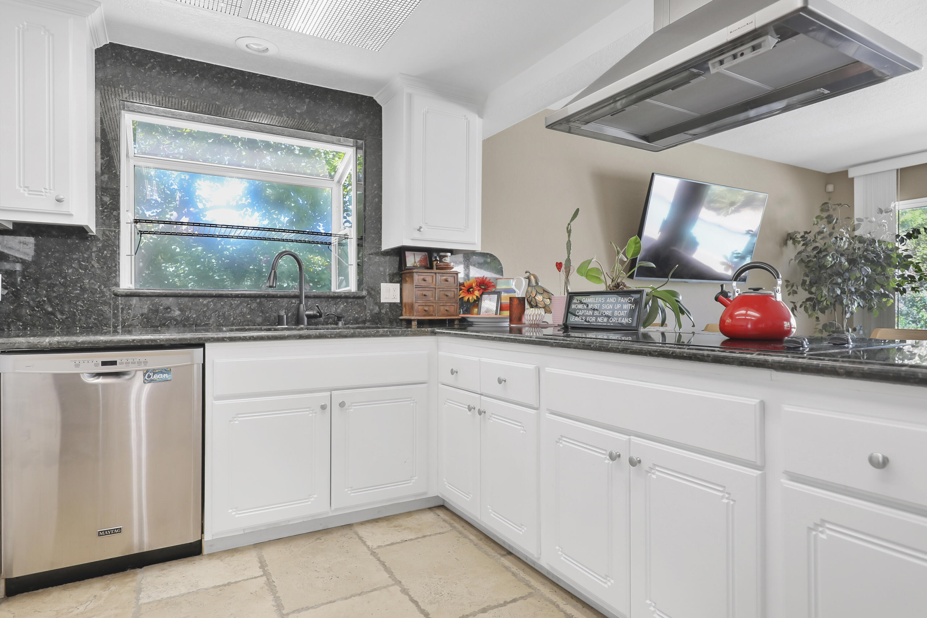 78950 Starlight Lane Bermuda Dunes, CA 92203 - Photo 17 of 40 a kitchen with white cabinets and sink
