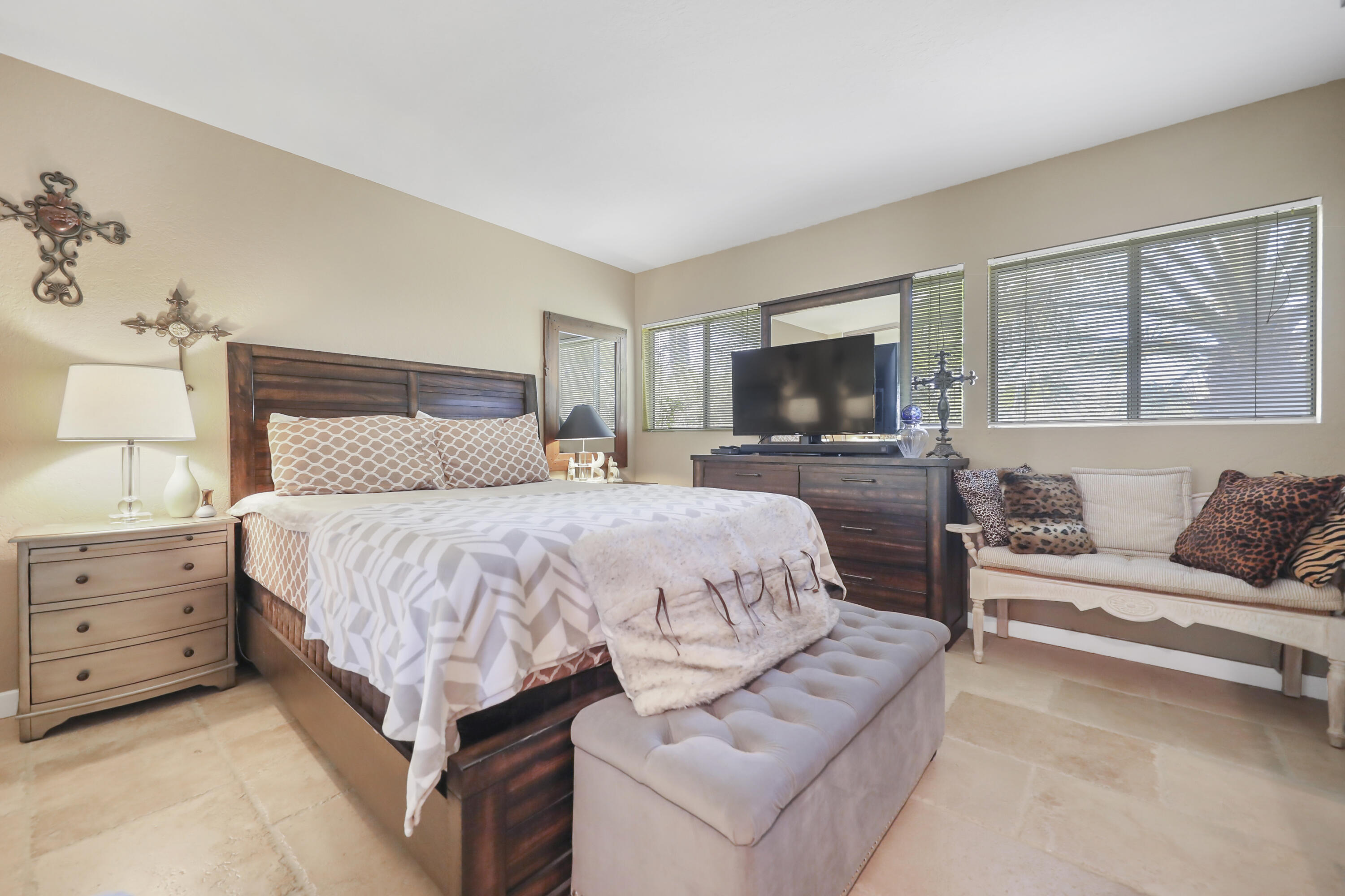 78950 Starlight Lane Bermuda Dunes, CA 92203 - Photo 23 of 40 a spacious bedroom with a bed and a couch