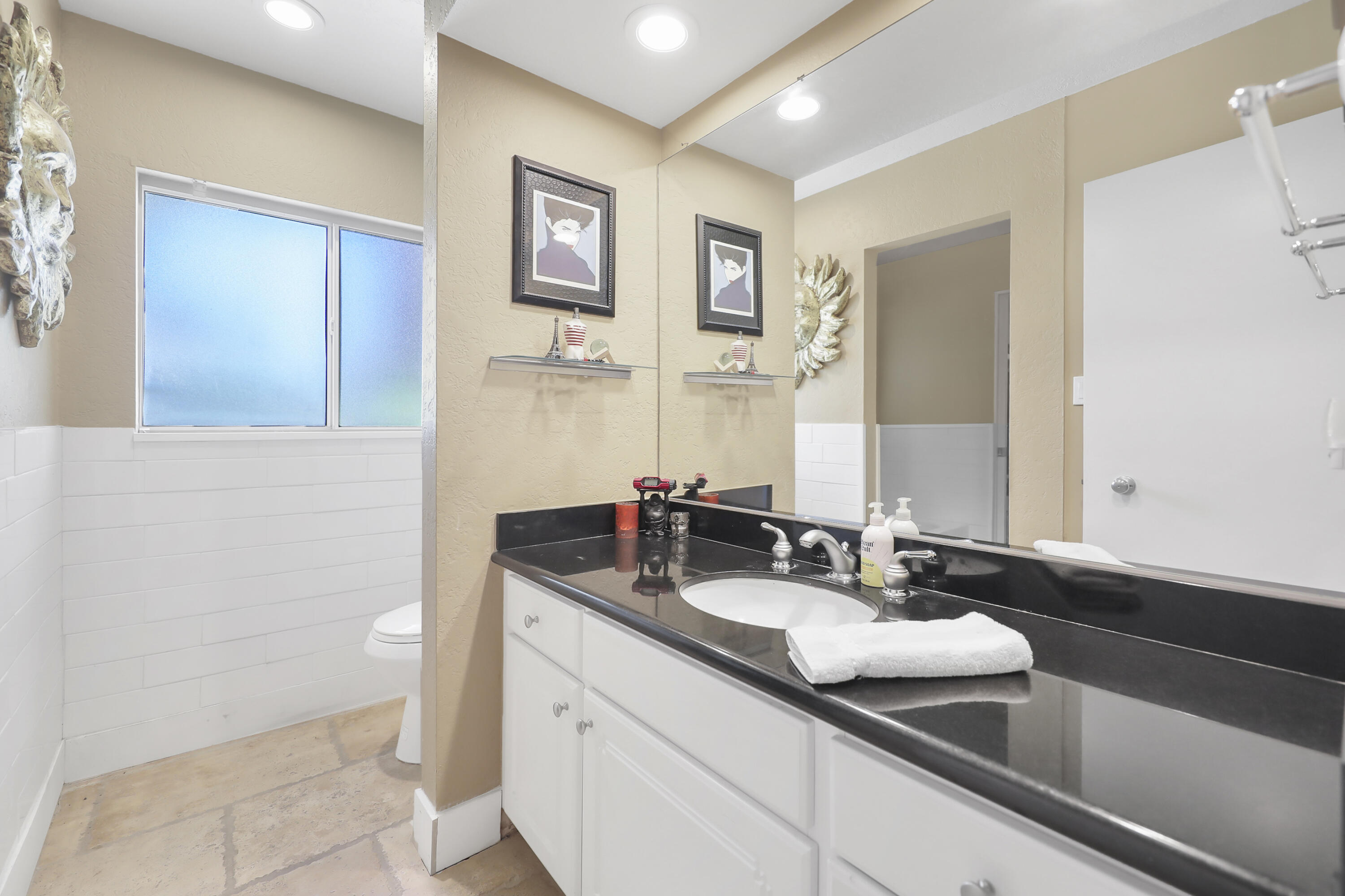 78950 Starlight Lane Bermuda Dunes, CA 92203 - Photo 24 of 40 a bathroom with a sink and a mirror