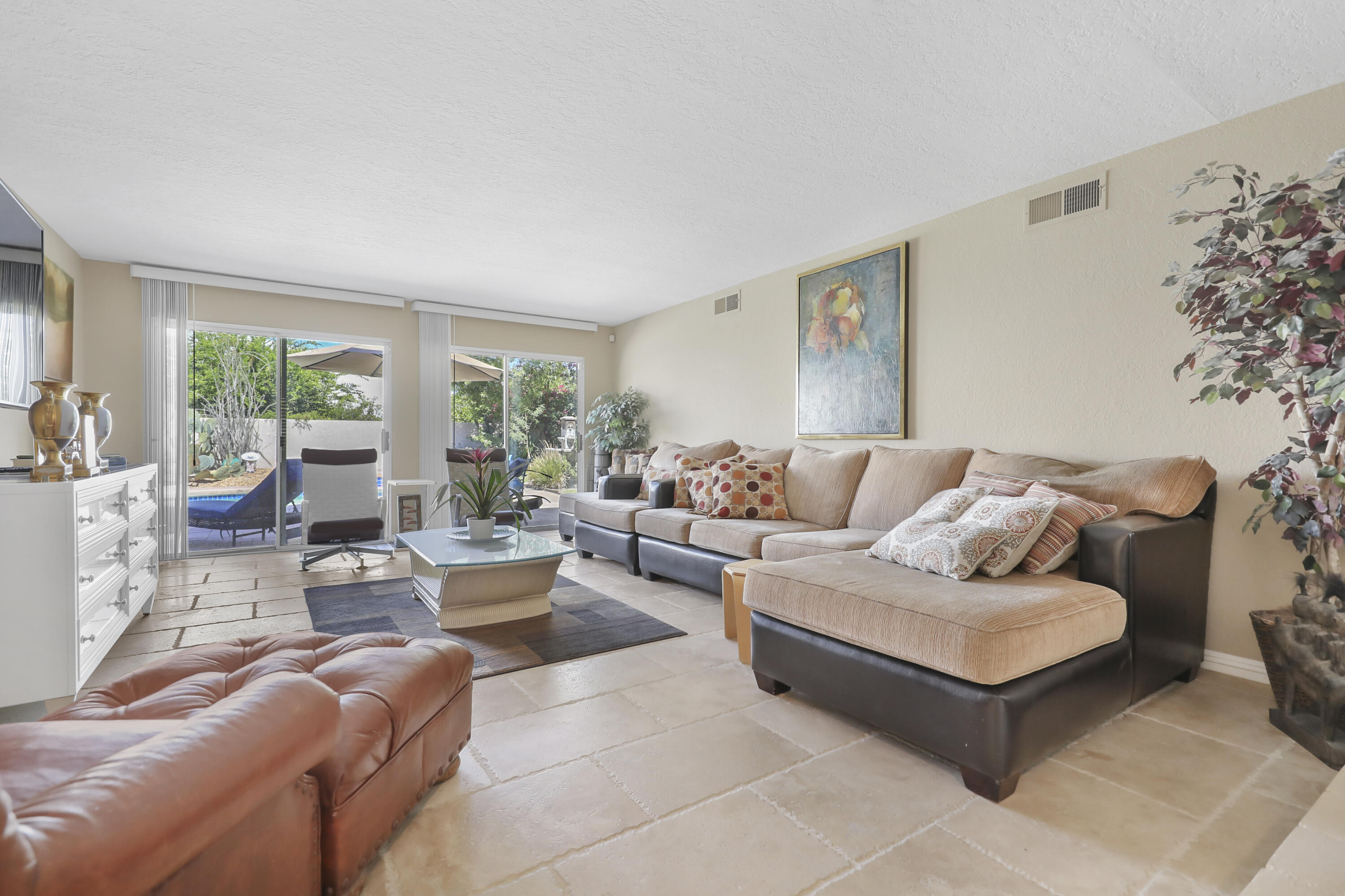 78950 Starlight Lane Bermuda Dunes, CA 92203 - Photo 27 of 40 a living room with furniture and large windows