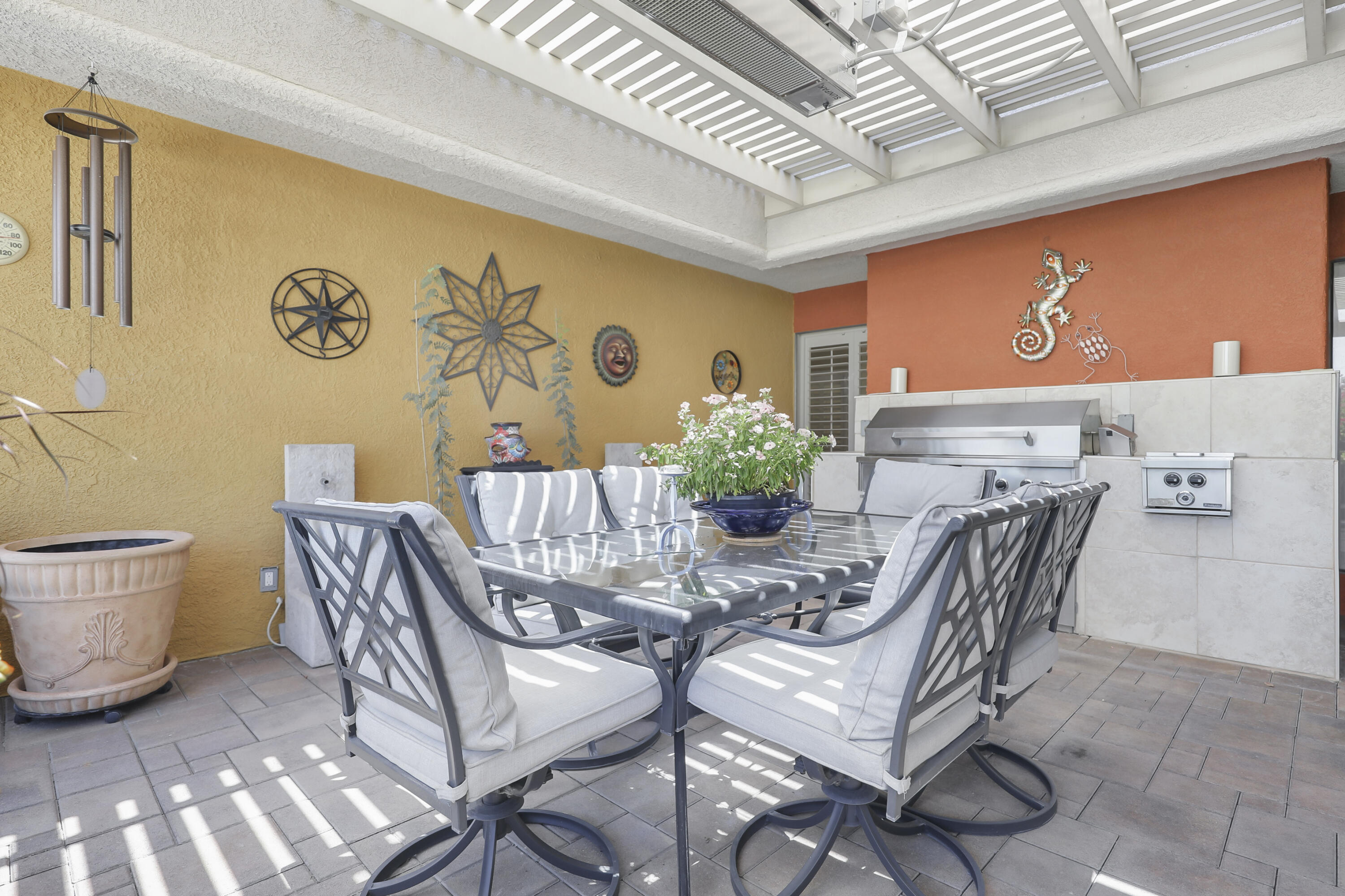 78950 Starlight Lane Bermuda Dunes, CA 92203 - Photo 28 of 40 a view of a dining room with furniture and a chandelier