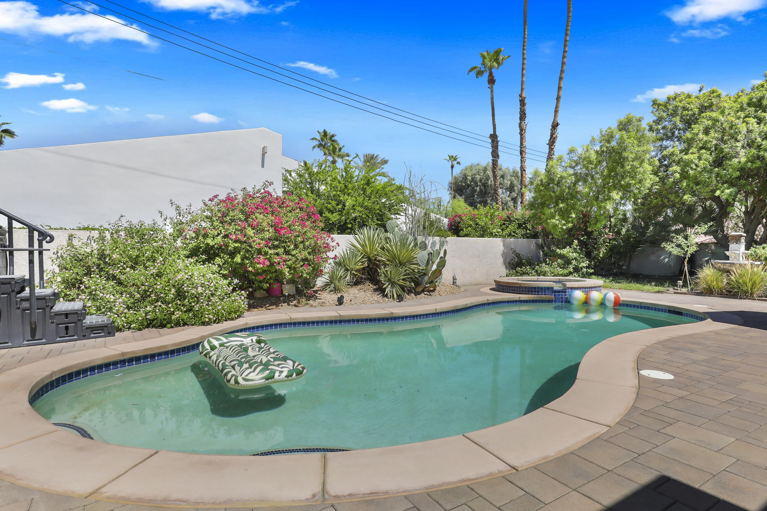 78950 Starlight Lane Bermuda Dunes, CA 92203 - Photo 32 of 40 a view of a swimming pool with a outdoor seating