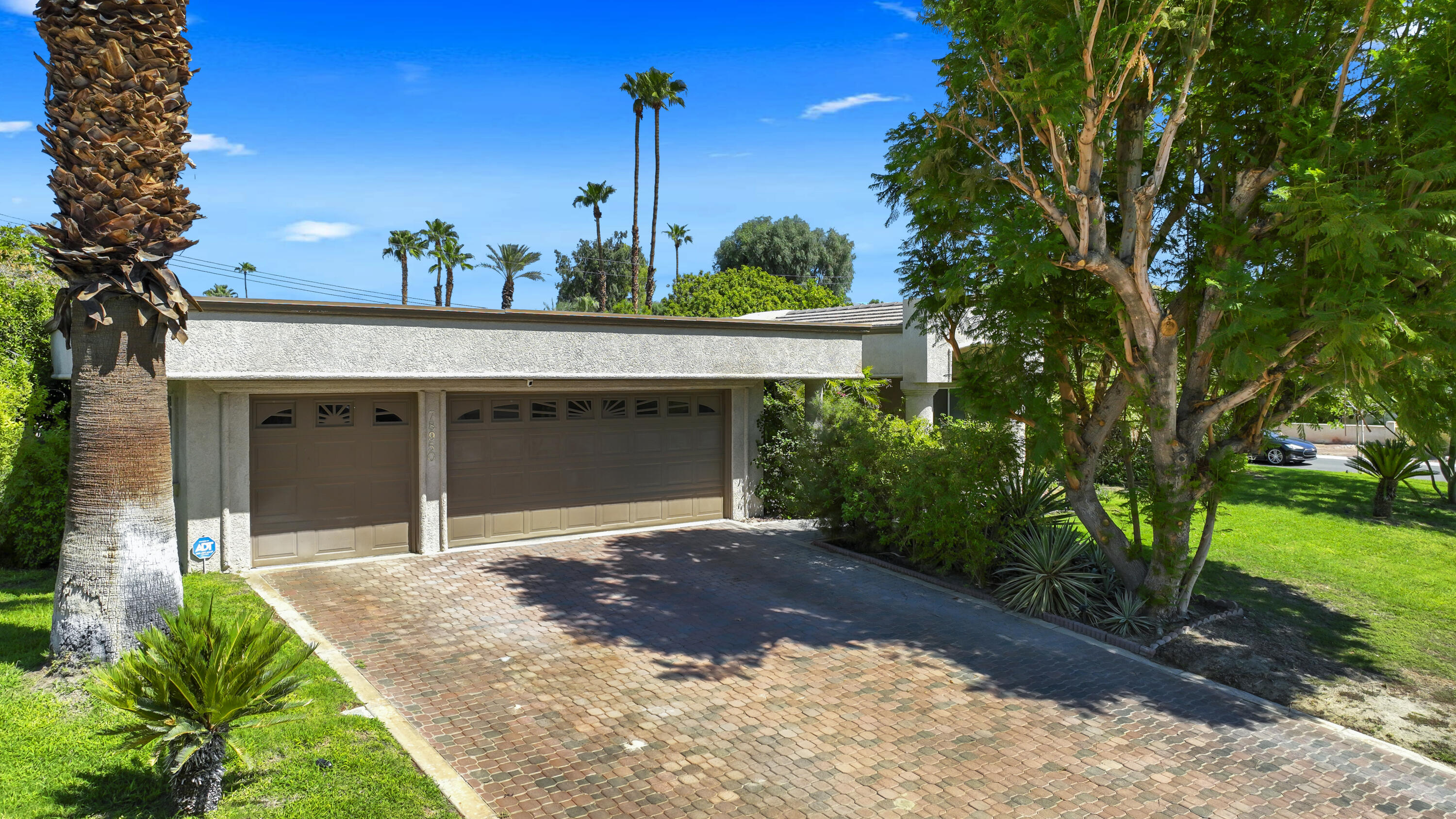 78950 Starlight Lane Bermuda Dunes, CA 92203 - Photo 40 of 40 a front view of a house with a garden