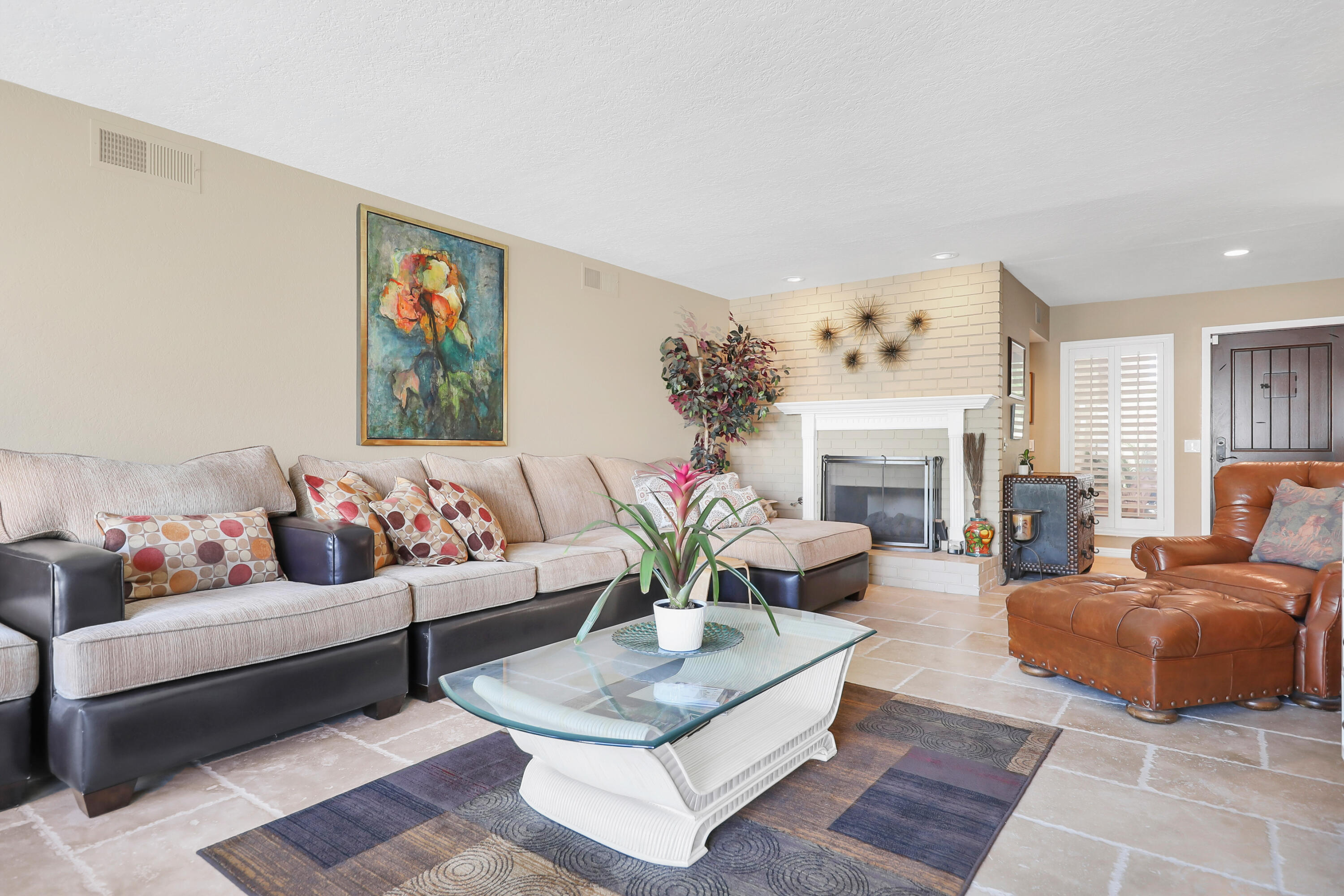 78950 Starlight Lane Bermuda Dunes, CA 92203 - Photo 7 of 40 a living room with furniture fireplace and a potted plant