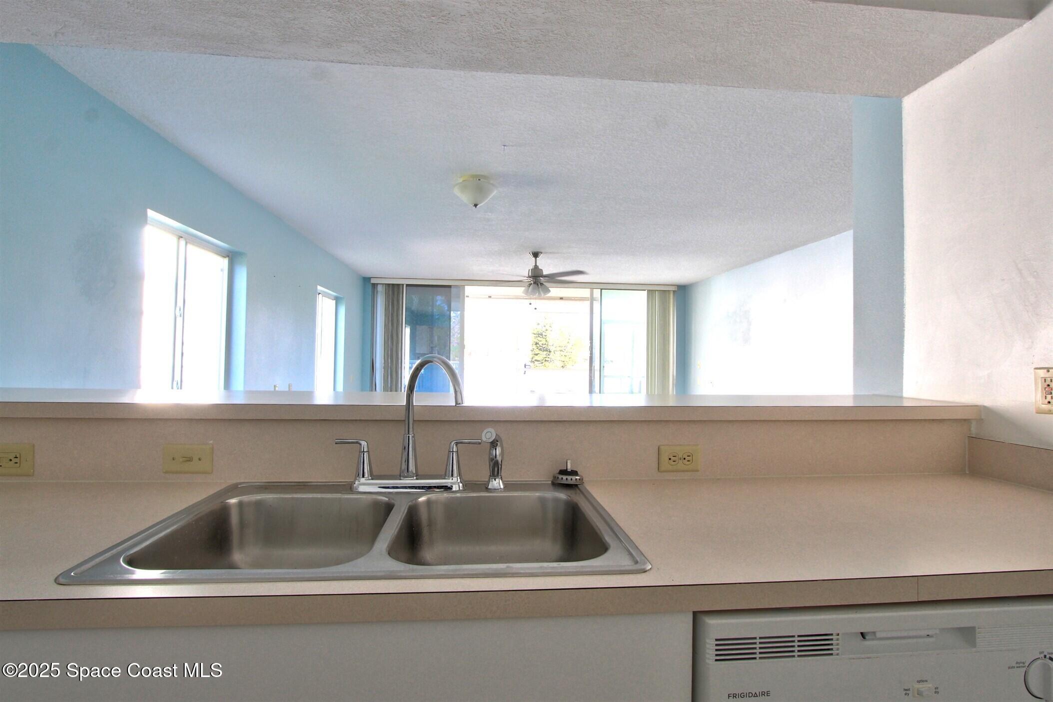 1420 Huntington Lane, Unit 2101 Rockledge, FL 32955 - Photo 22 of 38 a close view of sink and tap