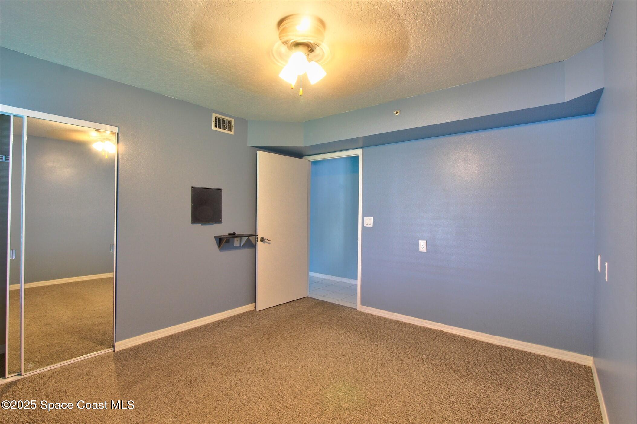 1420 Huntington Lane, Unit 2101 Rockledge, FL 32955 - Photo 26 of 38 a view of a livingroom with a staircase