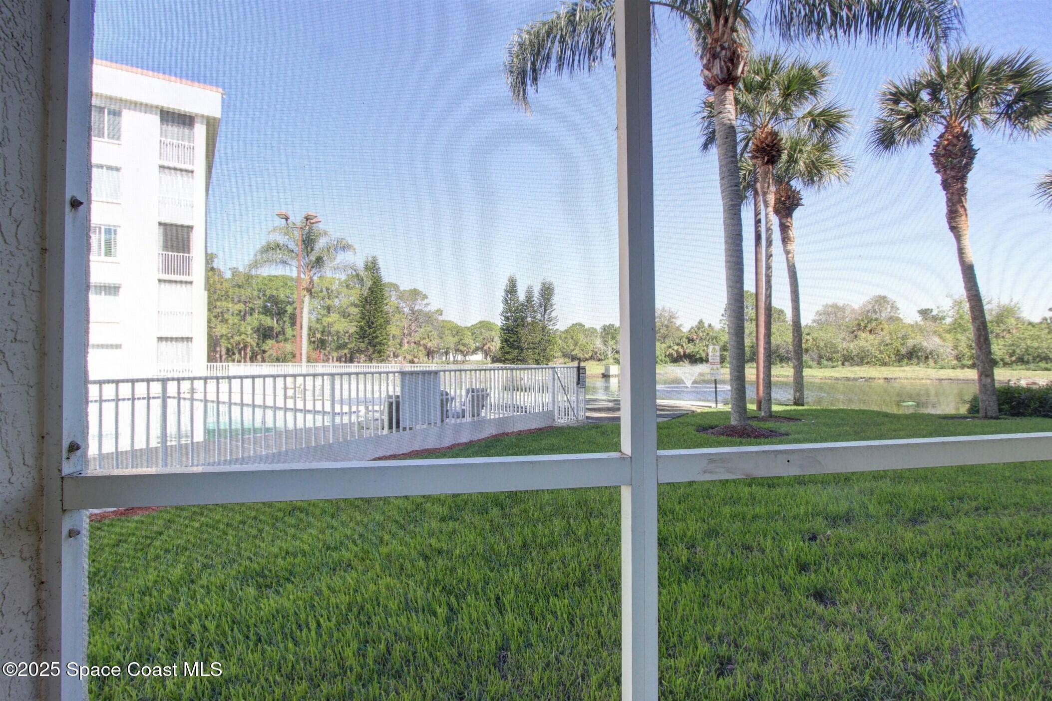 1420 Huntington Lane, Unit 2101 Rockledge, FL 32955 - Photo 6 of 38 a view of outdoor space and yard