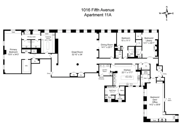 a spacious bedroom with a bed couch and a large window