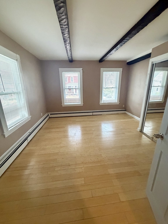 18 Avon Street, Unit B Reading, MA 01867 - Photo 12 of 14 a view of empty room with window